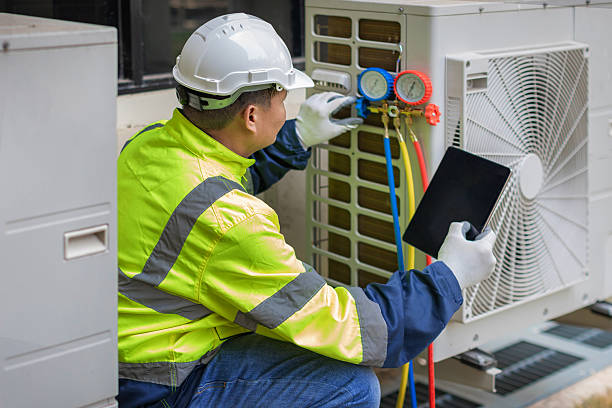 Professional Hvac technician working in Pell City, AL